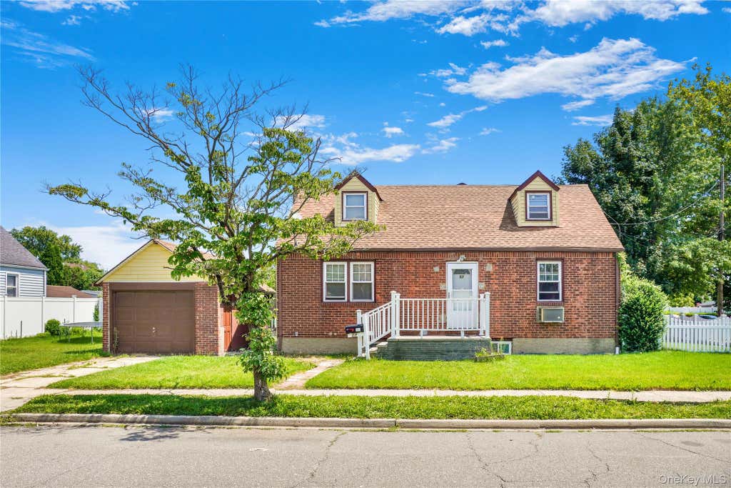 Photo of 57 Franklin Street, Elmont, NY 11003 (MLS # 1035456)