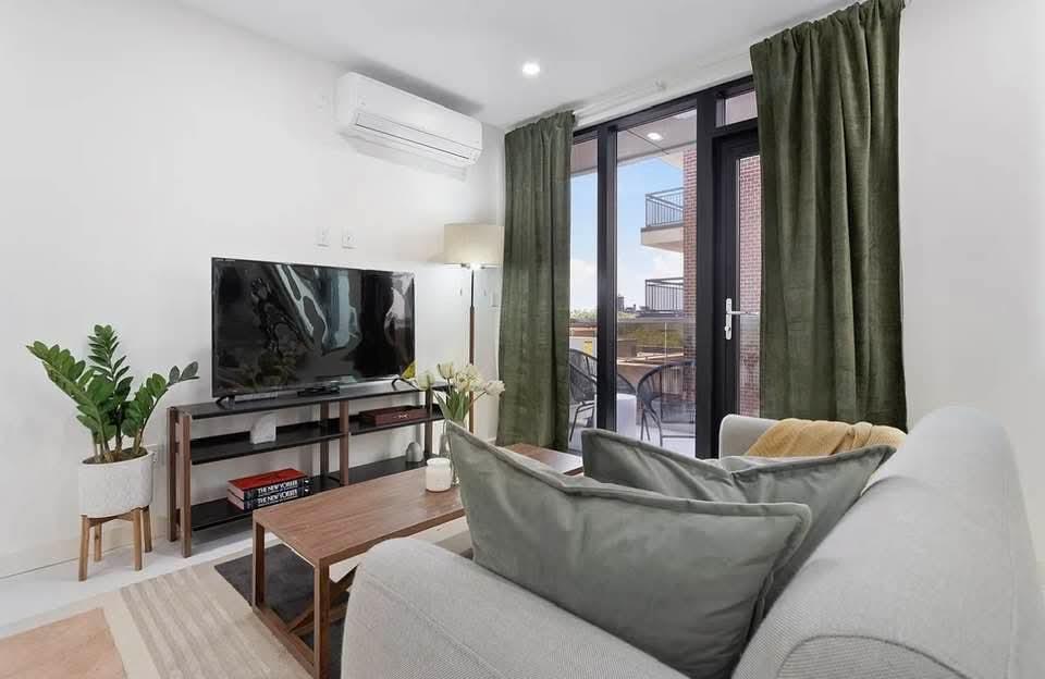 124-28 Queens Blvd 8A