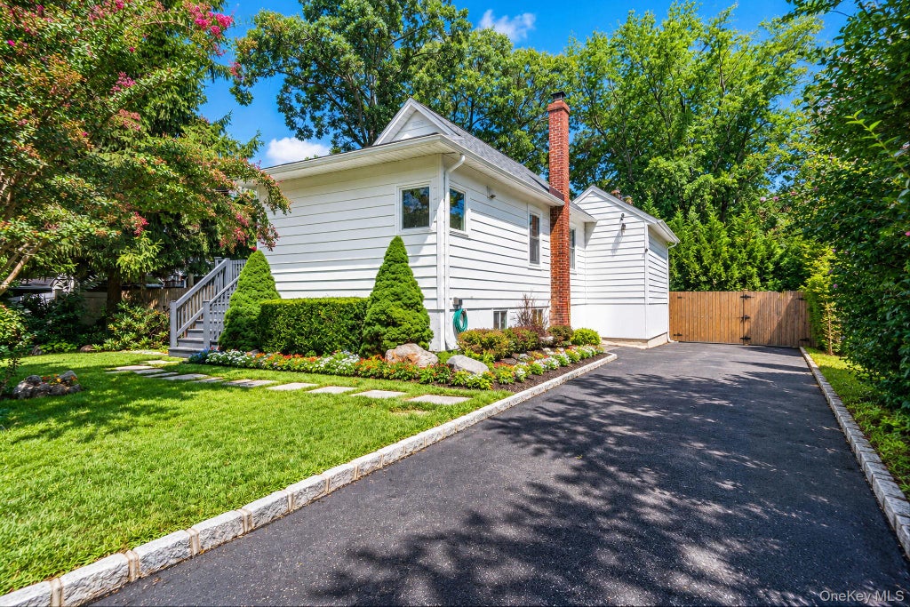 Photo of 39 Plandome Road, Sound Beach, NY 11789 (MLS # 1054347)