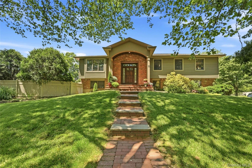 Photo of 11 Rockrose Lane, East Northport, NY 11731 (MLS # 1008774)