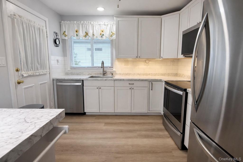 Photo of 2 Bedford Court, Ridge, NY 11961 (MLS # 964735)