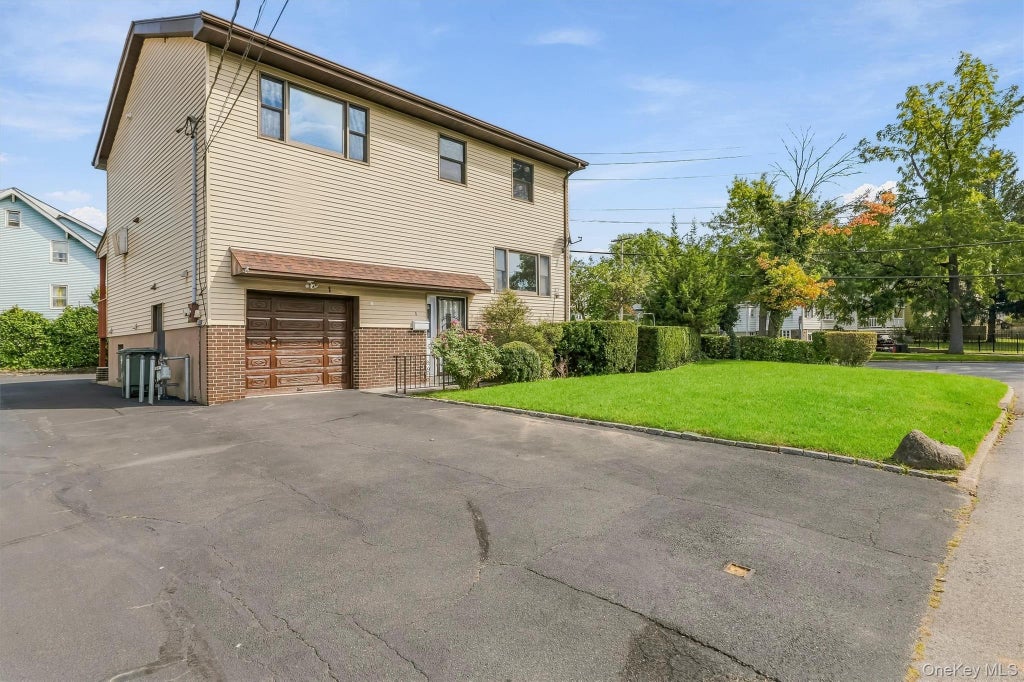 Photo of 1 W Glen Avenue, Port Chester, NY 10573 (MLS # 1053681)