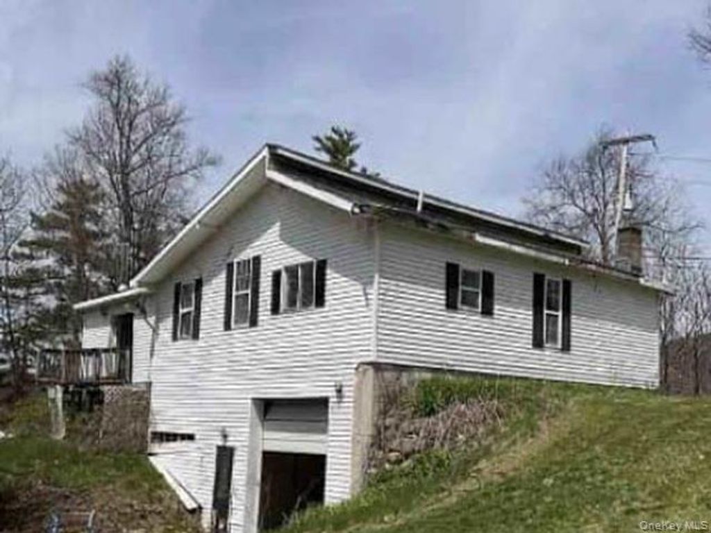 Photo of 32 Barber Road, Kattskill Bay, NY 12804 (MLS # 998243)