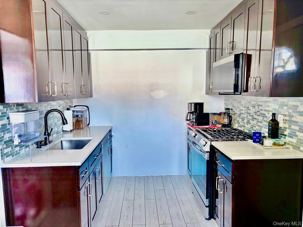 Photo of 13314 Hawtree Creek Road, South Ozone Park, NY 11420 (MLS # 978568)