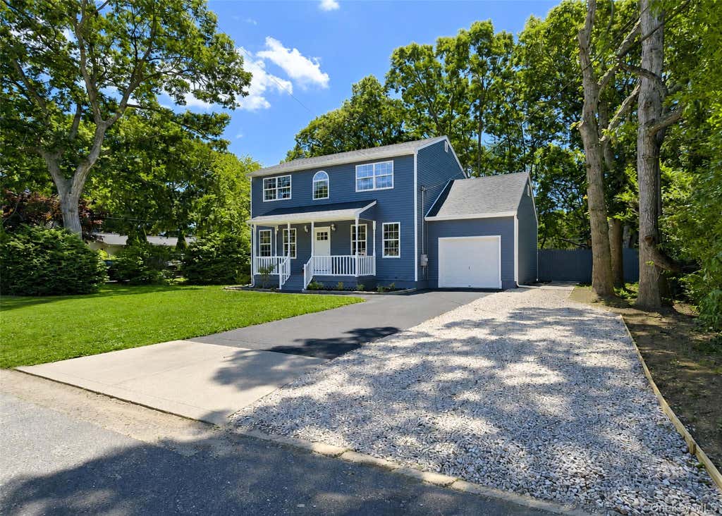 Photo of 74 Alcolade Drive E, Shirley, NY 11967 (MLS # 1022628)
