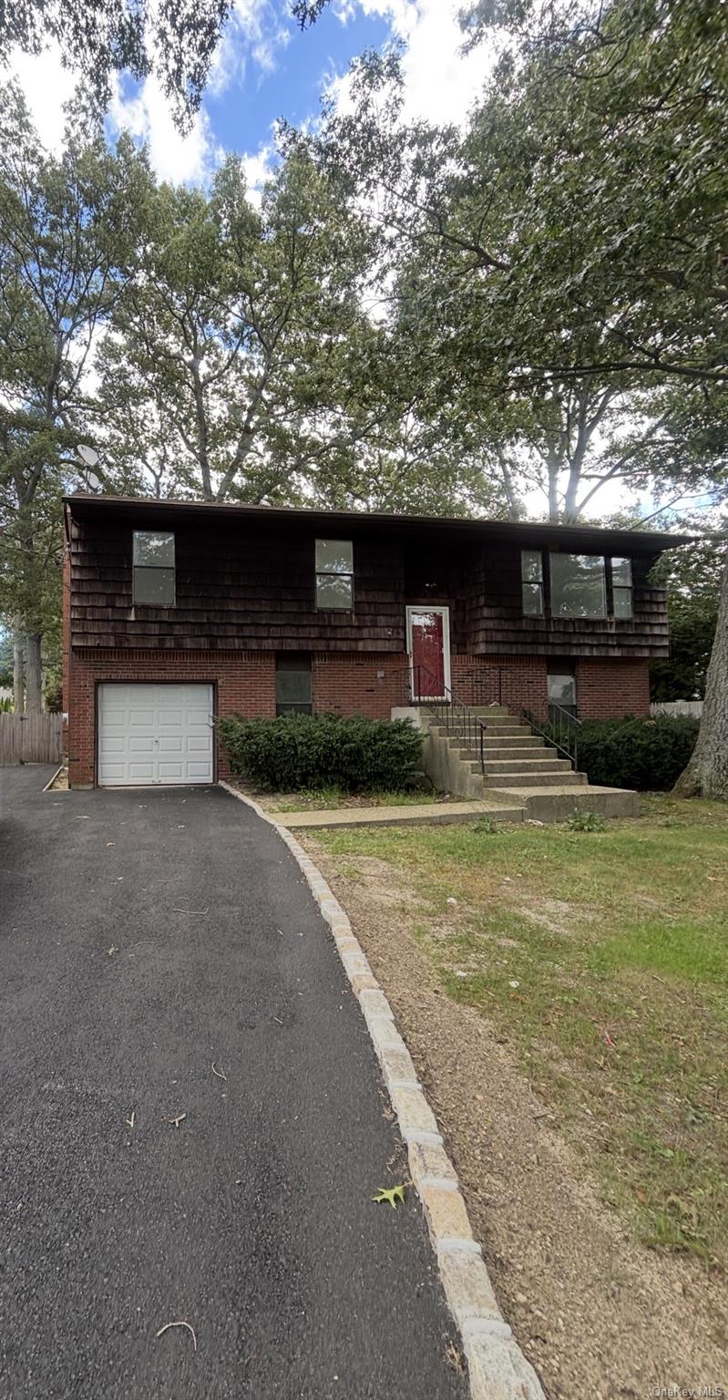 Photo of 39 Pond Path, Lake Grove, NY 11755 (MLS # 1054656)