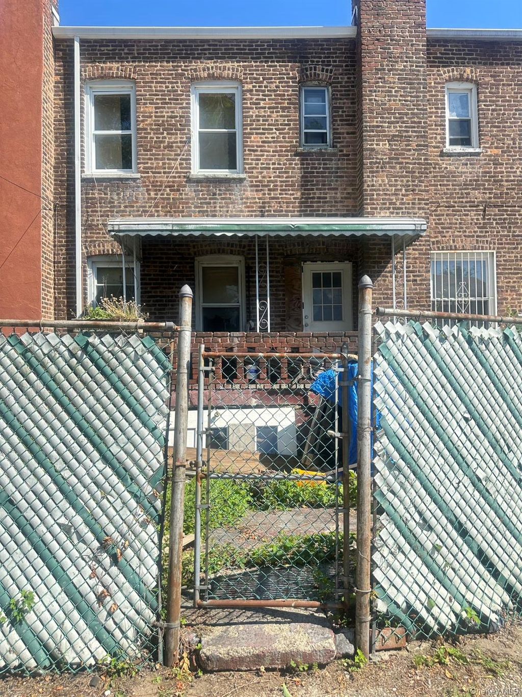 Photo of 140-19 Rose Avenue, Flushing, NY 11355 (MLS # 997537)