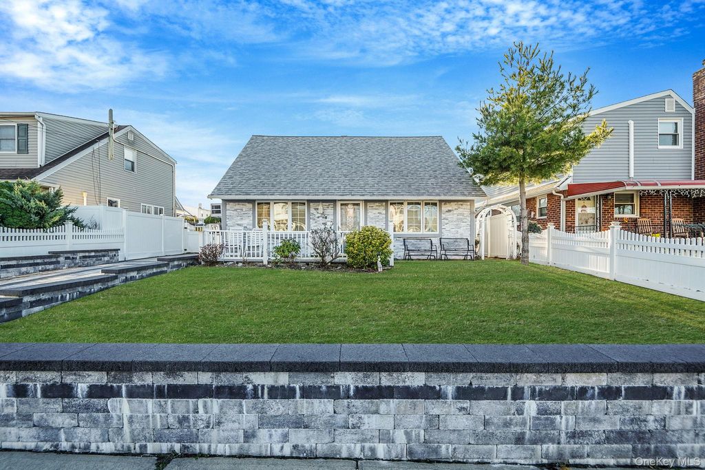 Photo of 897 Washington Avenue, Westbury, NY 11590 (MLS # 939814)