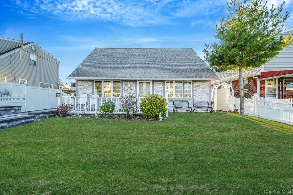 Photo of 897 Washington Avenue, Westbury, NY 11590 (MLS # 939814)
