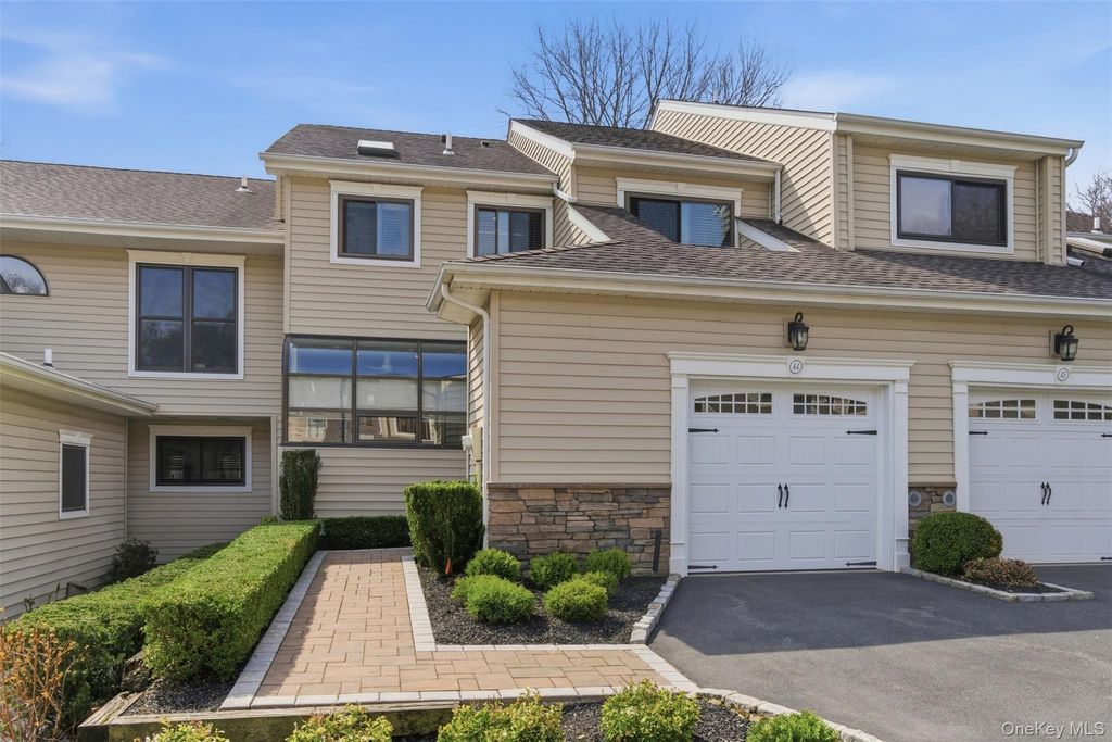 Photo of 44 Villas Circle, Melville, NY 11747 (MLS # 985768)