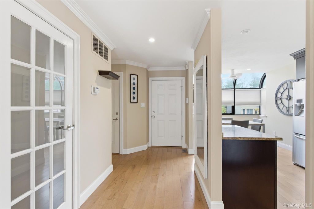 Photo of 44 Villas Circle, Melville, NY 11747 (MLS # 985768)