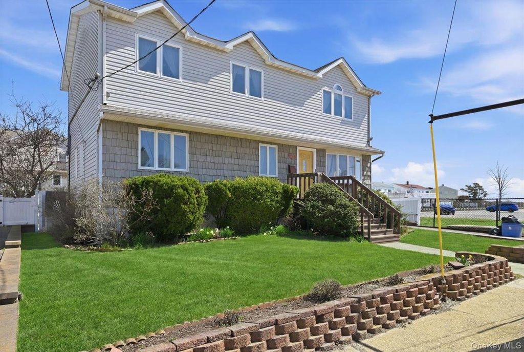 Photo of 955 S Long Beach Avenue, Freeport, NY 11520 (MLS # 981763)