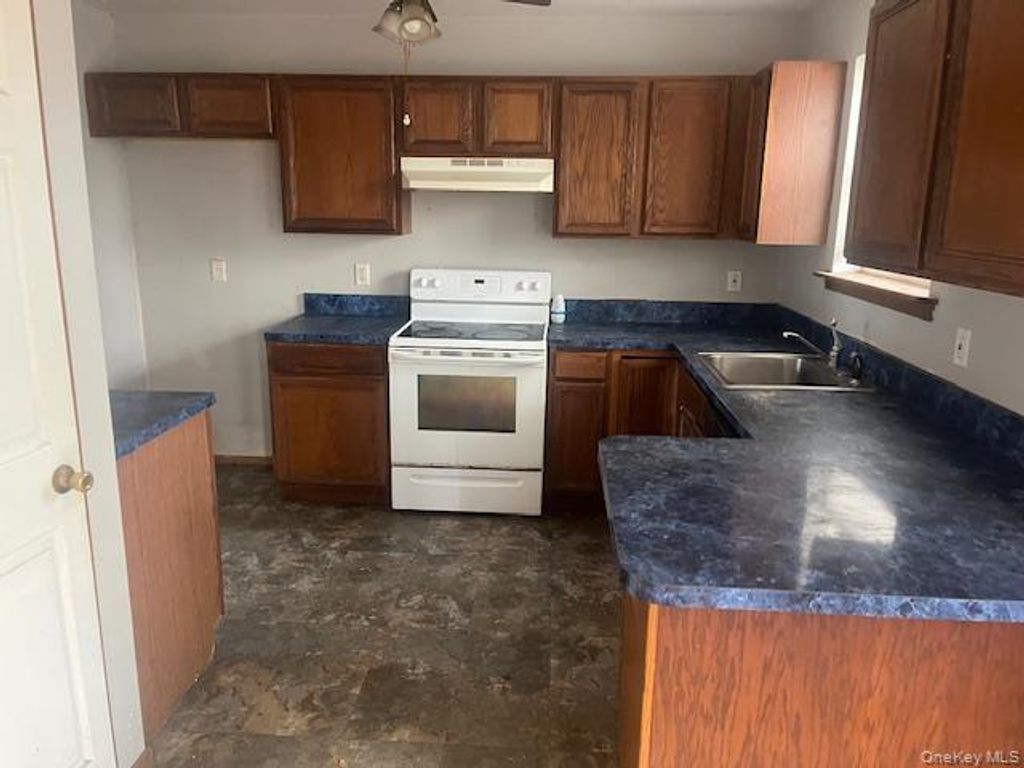 Photo of 74 Alcolade Drive E, Shirley, NY 11967 (MLS # 966186)