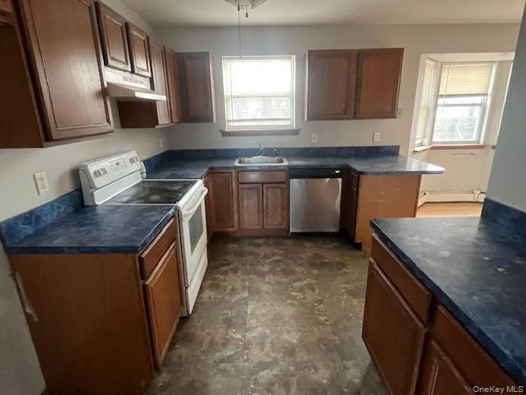 Photo of 74 Alcolade Drive E, Shirley, NY 11967 (MLS # 966186)