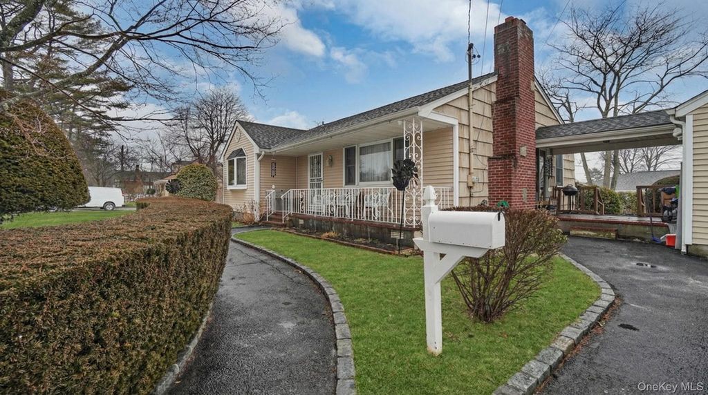 Photo of 4 Roosevelt Street, Brentwood, NY 11717 (MLS # 973097)