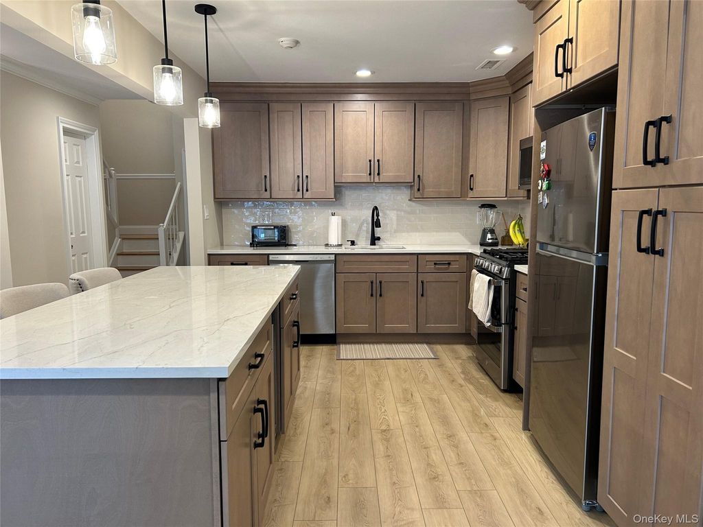 Photo of 65 Erik Drive, East Setauket, NY 11733 (MLS # 967592)