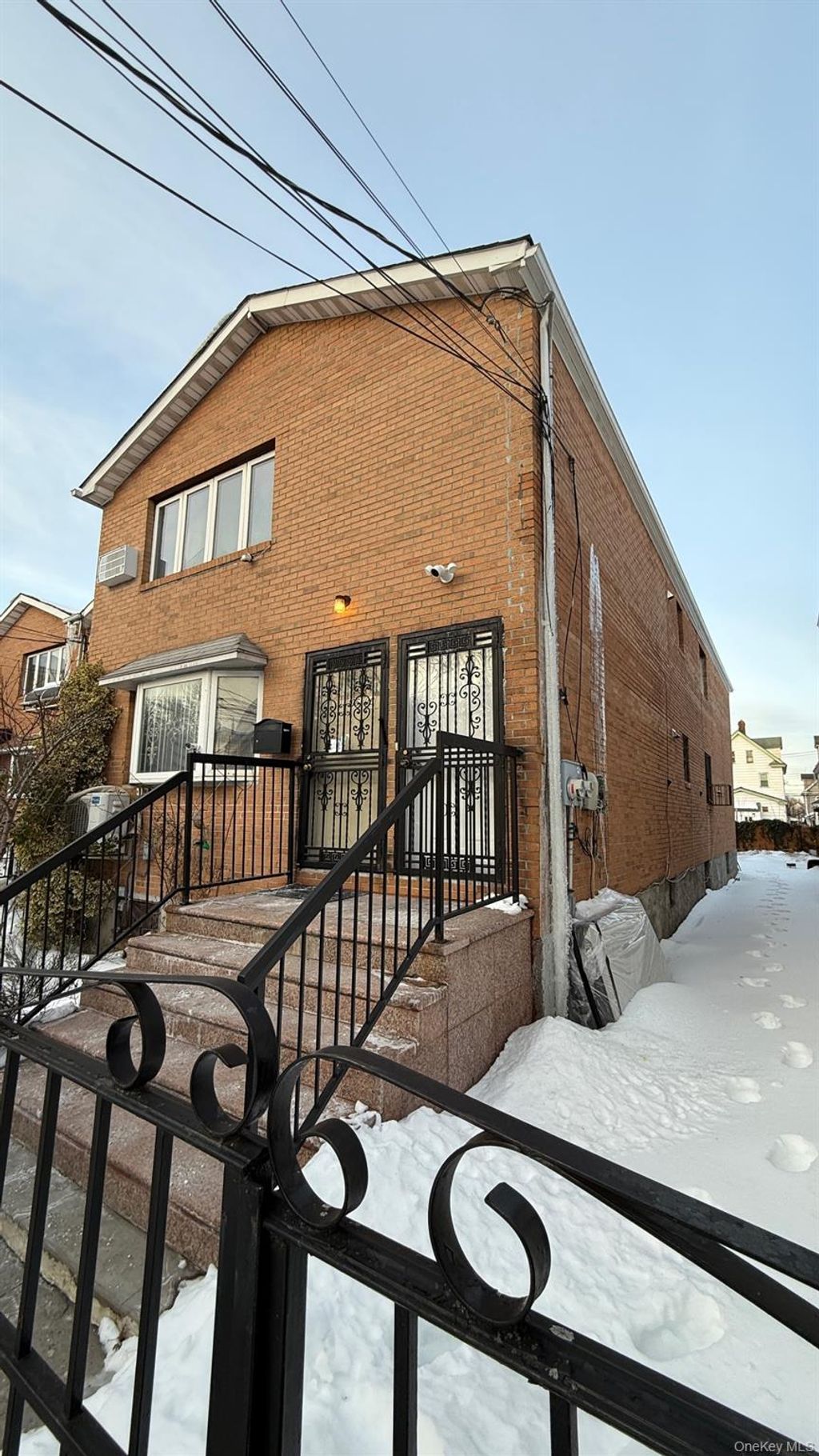 Photo of 10609 Remington Street, Jamaica, NY 11435 (MLS # 958753)