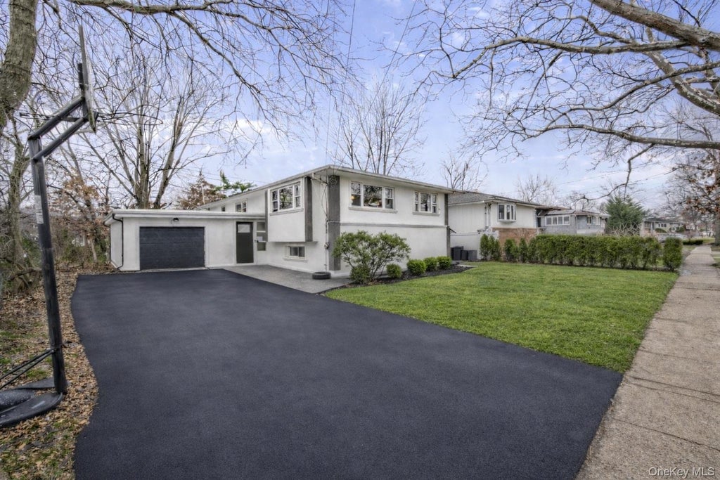 Photo of 1016 Westwood Road, Woodmere, NY 11598 (MLS # 1066828)
