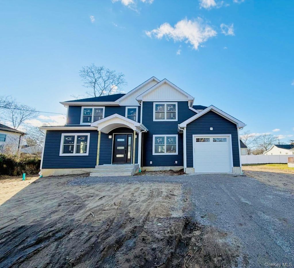 Photo of 176 W Beaver Drive, Mastic Beach, NY 11951 (MLS # 946826)