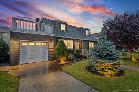 Photo of 169 Sunset Avenue, Island Park, NY 11558 (MLS # 910157)