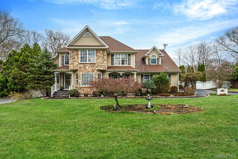 Photo of 17 Holmes Avenue, Eastport, NY 11941 (MLS # 988159)