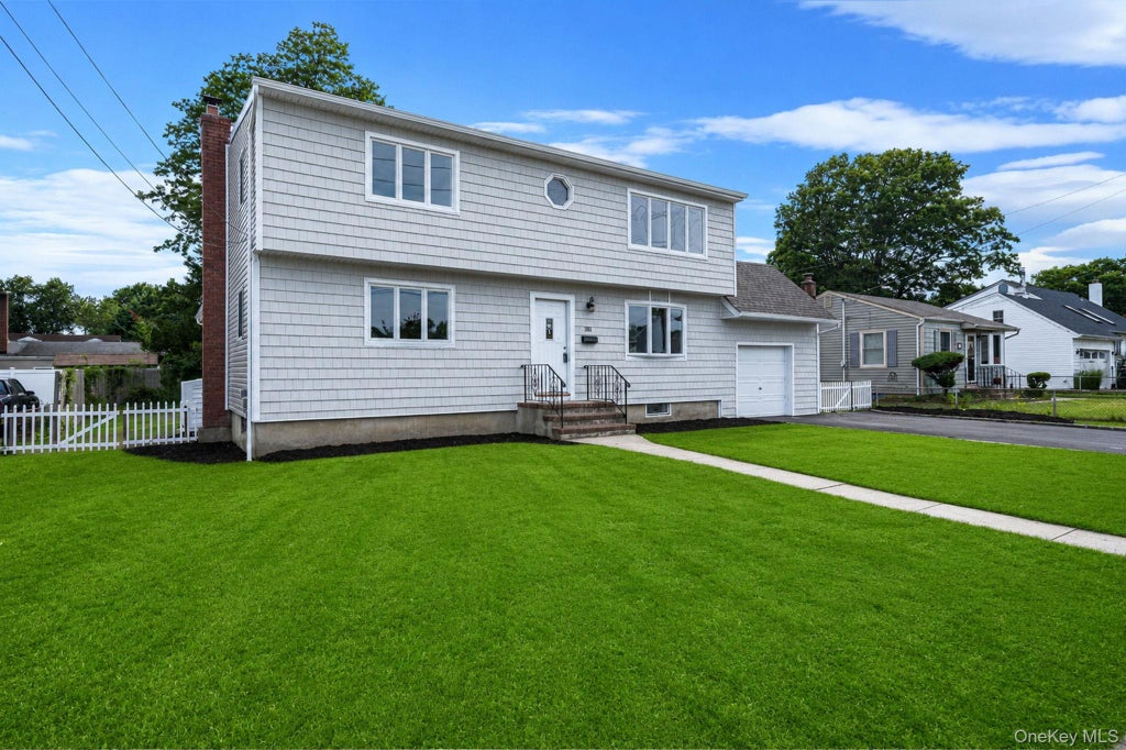 Photo of 381 N Clinton Avenue, Lindenhurst, NY 11757 (MLS # 1019140)