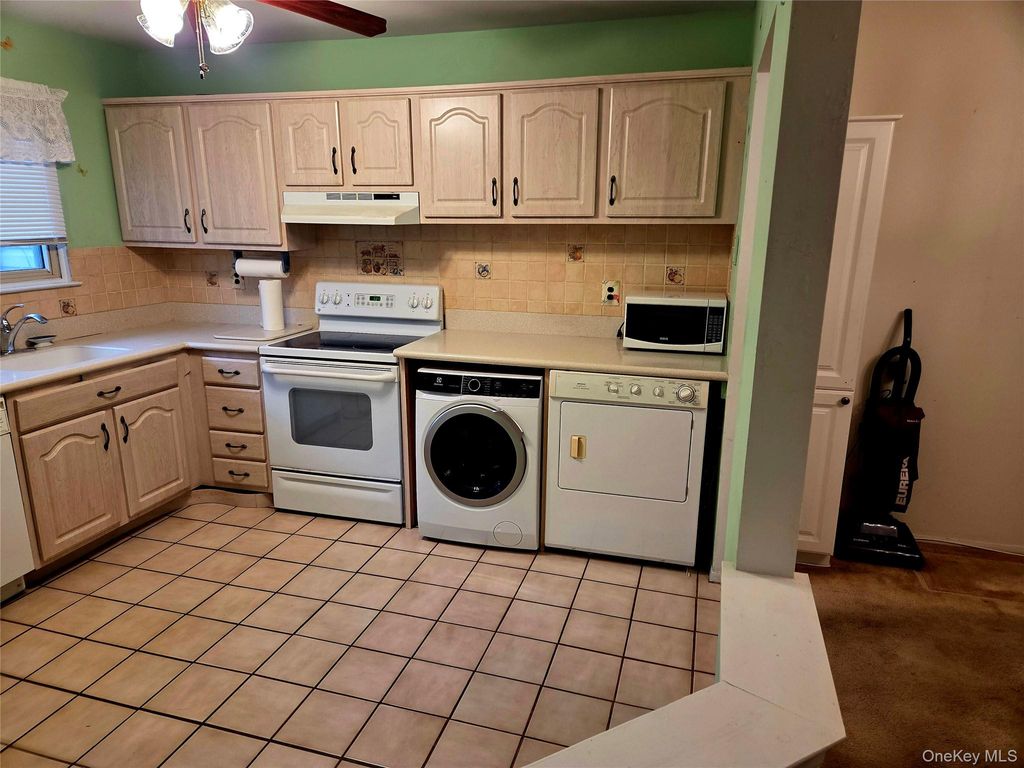 Photo of 650 Newbridge Road #36, East Meadow, NY 11554 (MLS # 971592)