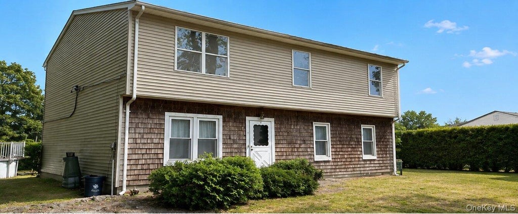 Photo of 7 Gaynor Road, Centereach, NY 11720 (MLS # 1050065)