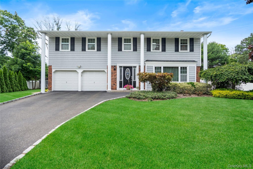 Photo of 16 Bruce Drive, South Setauket, NY 11720 (MLS # 1020777)