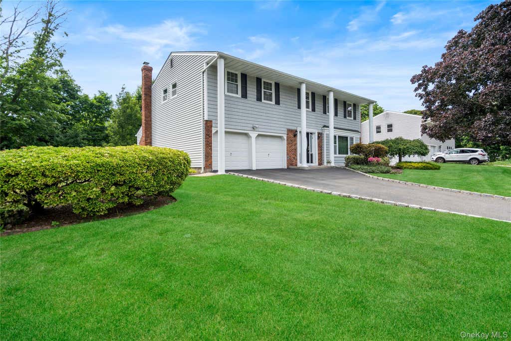Photo of 16 Bruce Drive, South Setauket, NY 11720 (MLS # 1020777)