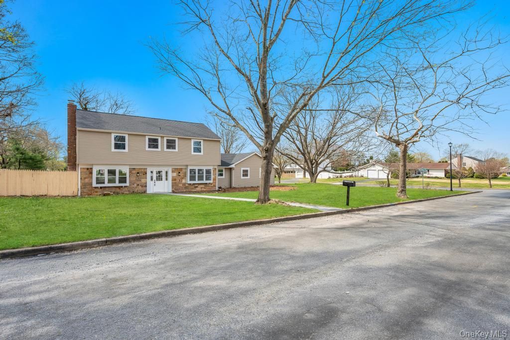 Photo of 4 Chevy Drive, South Setauket, NY 11720 (MLS # 986403)