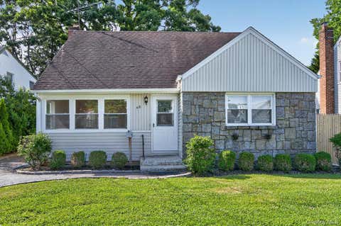 Photo of 48 Locust Street, Westbury, NY 11590 (MLS # 1000789)
