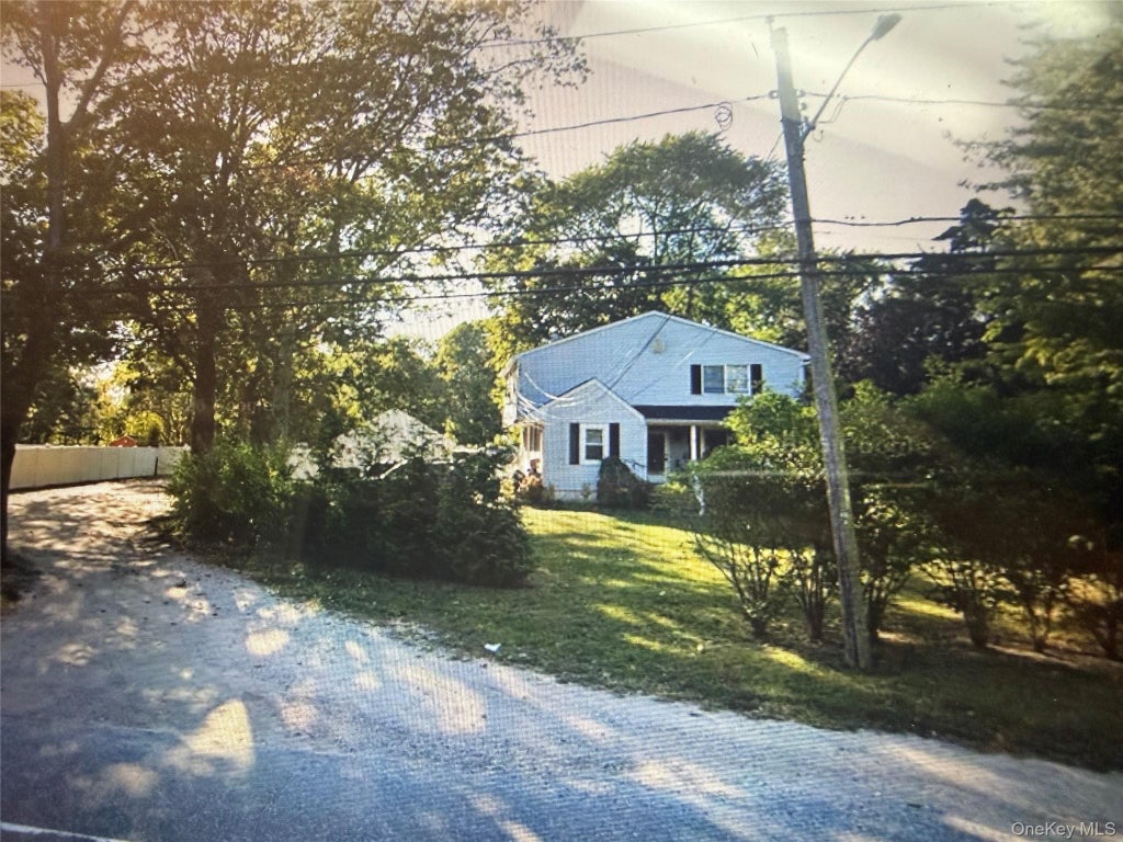 Photo of 928 Connetquot Avenue, Central Islip, NY 11722 (MLS # 1054965)