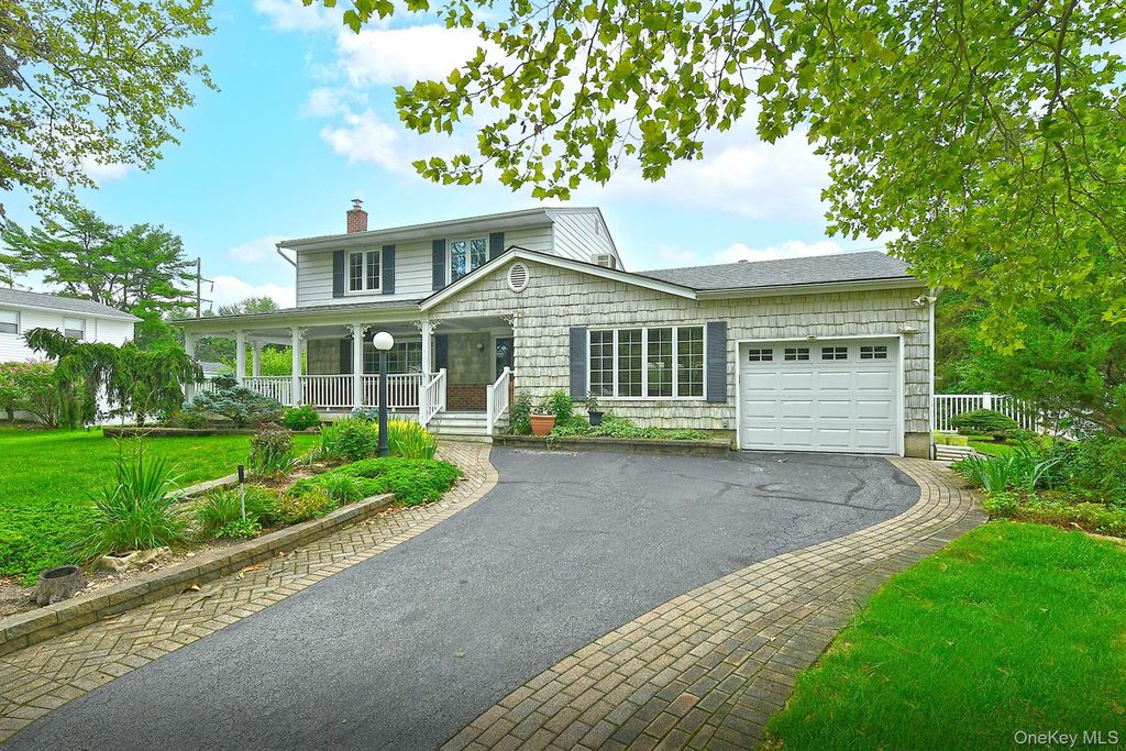 Photo of 10 Linford Lane, Melville, NY 11747 (MLS # 1028782)