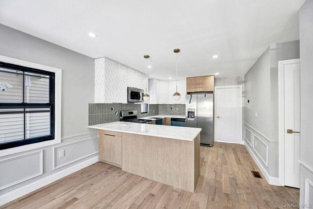 Photo of 9318 Foster Avenue, Brooklyn, NY 11236 (MLS # 956951)