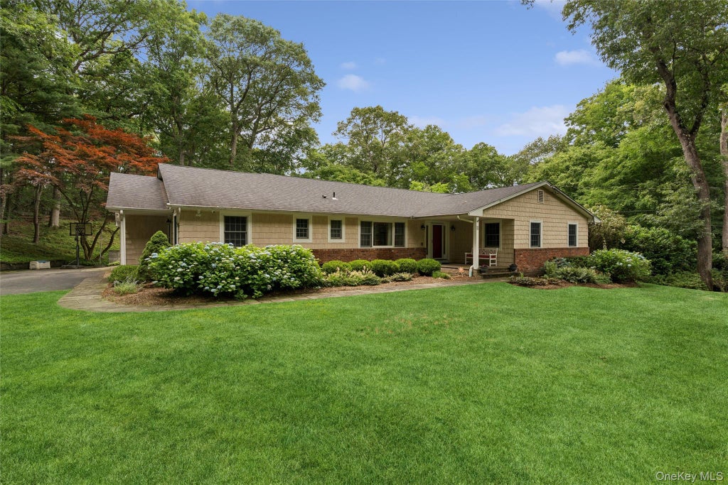 Photo of 35 Woodvale Drive, Syosset, NY 11791 (MLS # 1012505)