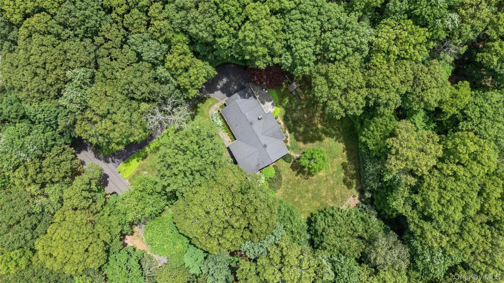 Photo of 35 Woodvale Drive, Syosset, NY 11791 (MLS # 1012505)