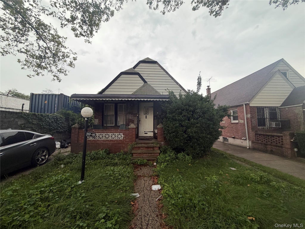 Photo of 117-11 227TH Street, Cambria Heights, NY 11411 (MLS # 1044446)