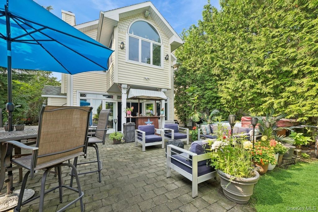 Photo of 101 Bay St St, East Atlantic Beach, NY 11561 (MLS # 988079)