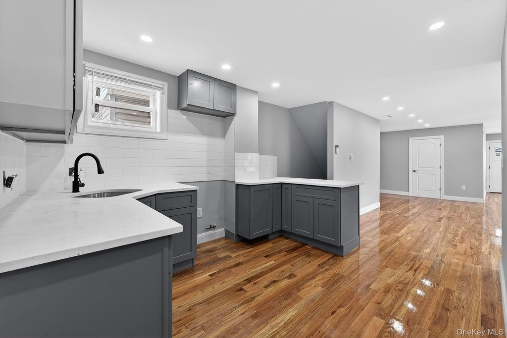 Photo of 11019 Liverpool Street, Jamaica, NY 11435 (MLS # 968104)