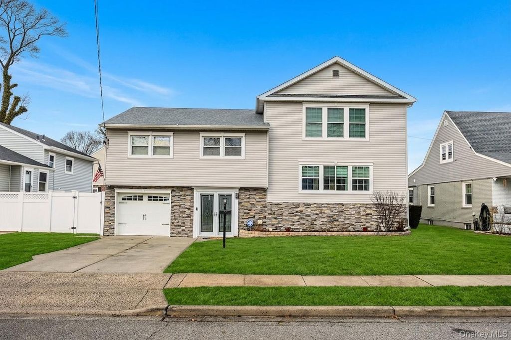 Photo of 495 Russell Street, Baldwin, NY 11510 (MLS # 973115)