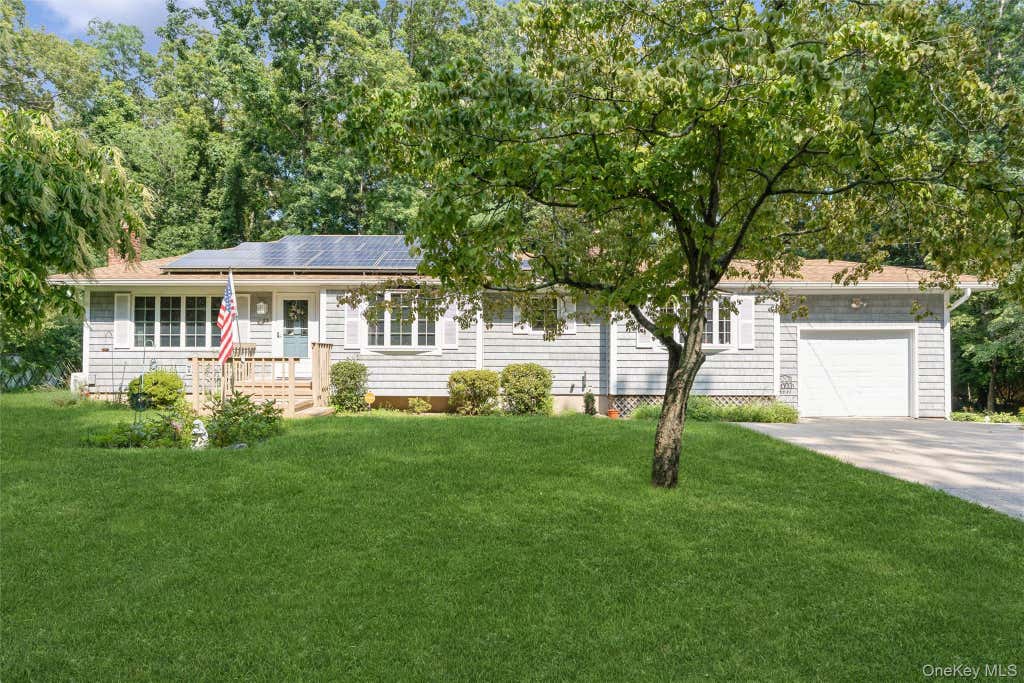 Photo of 31 Cedar Branch Street, Middle Island, NY 11953 (MLS # 1041400)