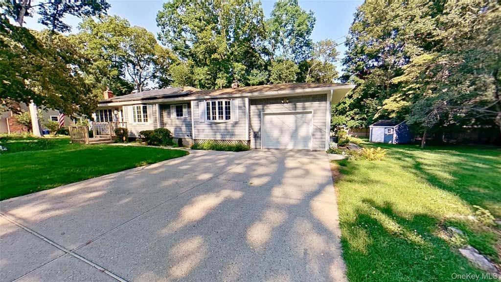 Photo of 31 Cedar Branch Street, Middle Island, NY 11953 (MLS # 1041400)
