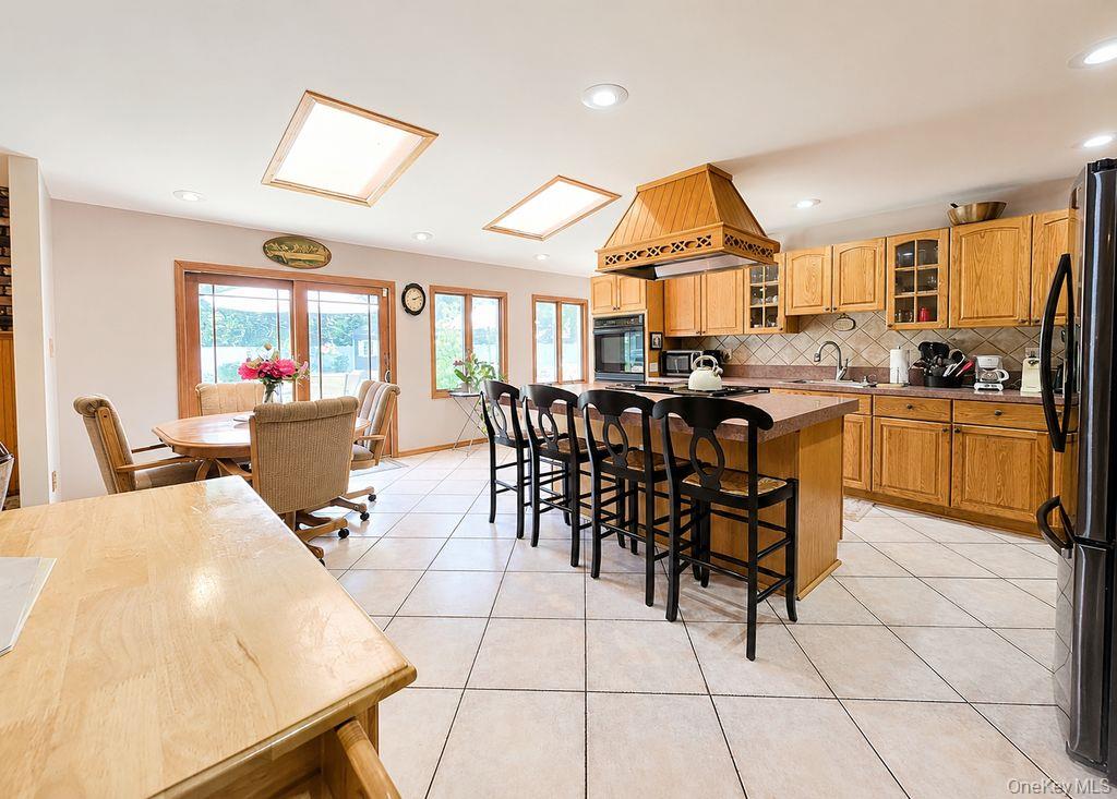 Photo of 53 Orleans Green, Coram, NY 11727 (MLS # 1030640)