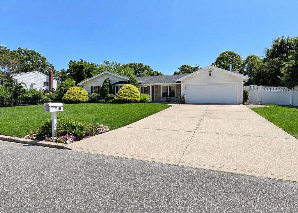Photo of 53 Orleans Green, Coram, NY 11727 (MLS # 1030640)