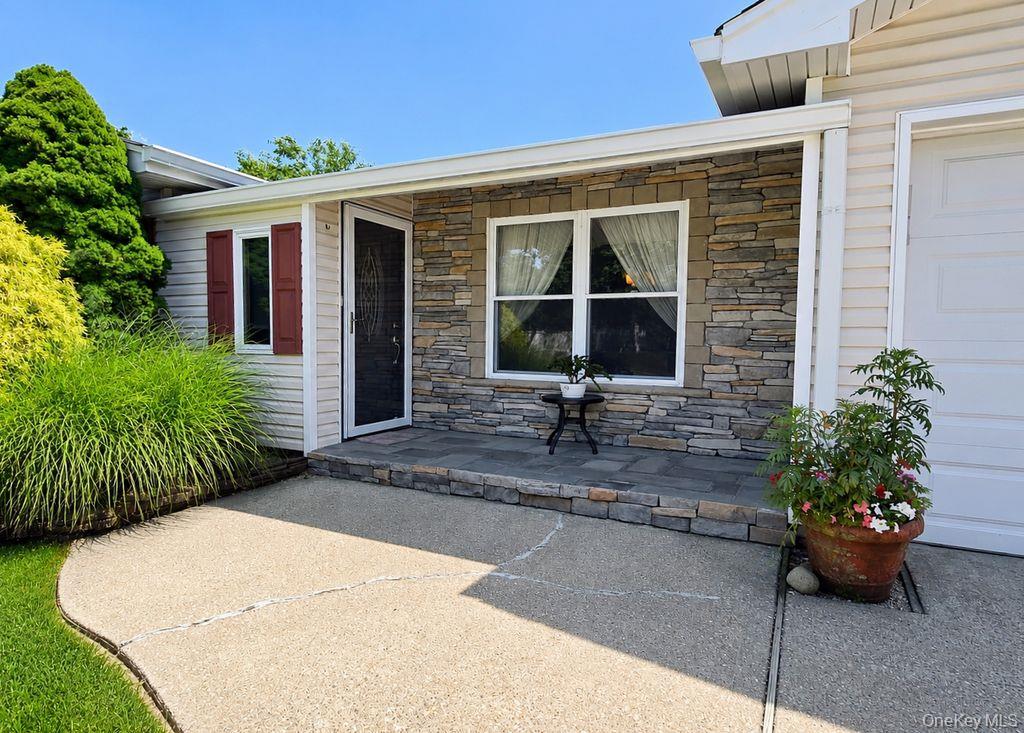 Photo of 53 Orleans Green, Coram, NY 11727 (MLS # 1030640)