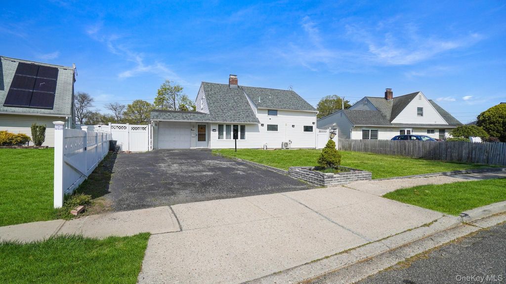Photo of 63 Blacksmith Road, Levittown, NY 11756 (MLS # 990743)