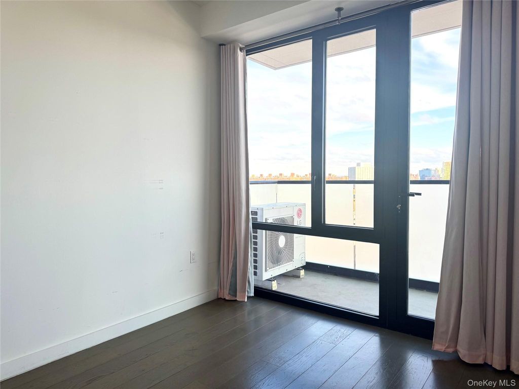 Photo of 8808 Justice Avenue #15N, Elmhurst, NY 11373 (MLS # 954540)