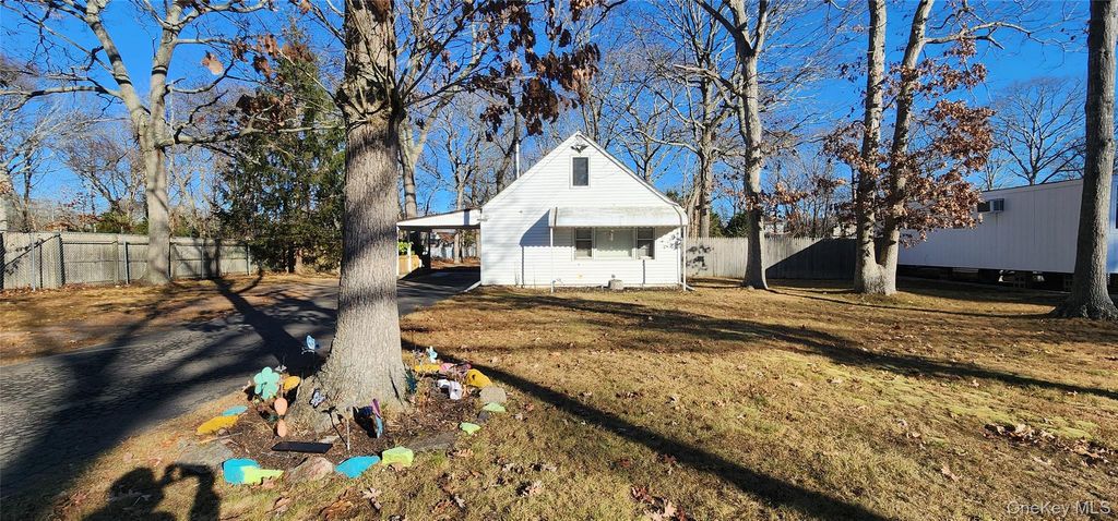 Photo of 299 Whittier Drive, Mastic Beach, NY 11951 (MLS # 943897)