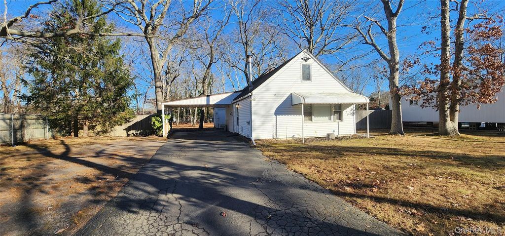 Photo of 299 Whittier Drive, Mastic Beach, NY 11951 (MLS # 943897)